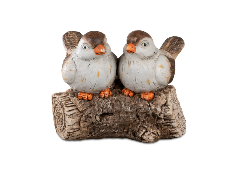 Vogelpaar auf Baumstamm